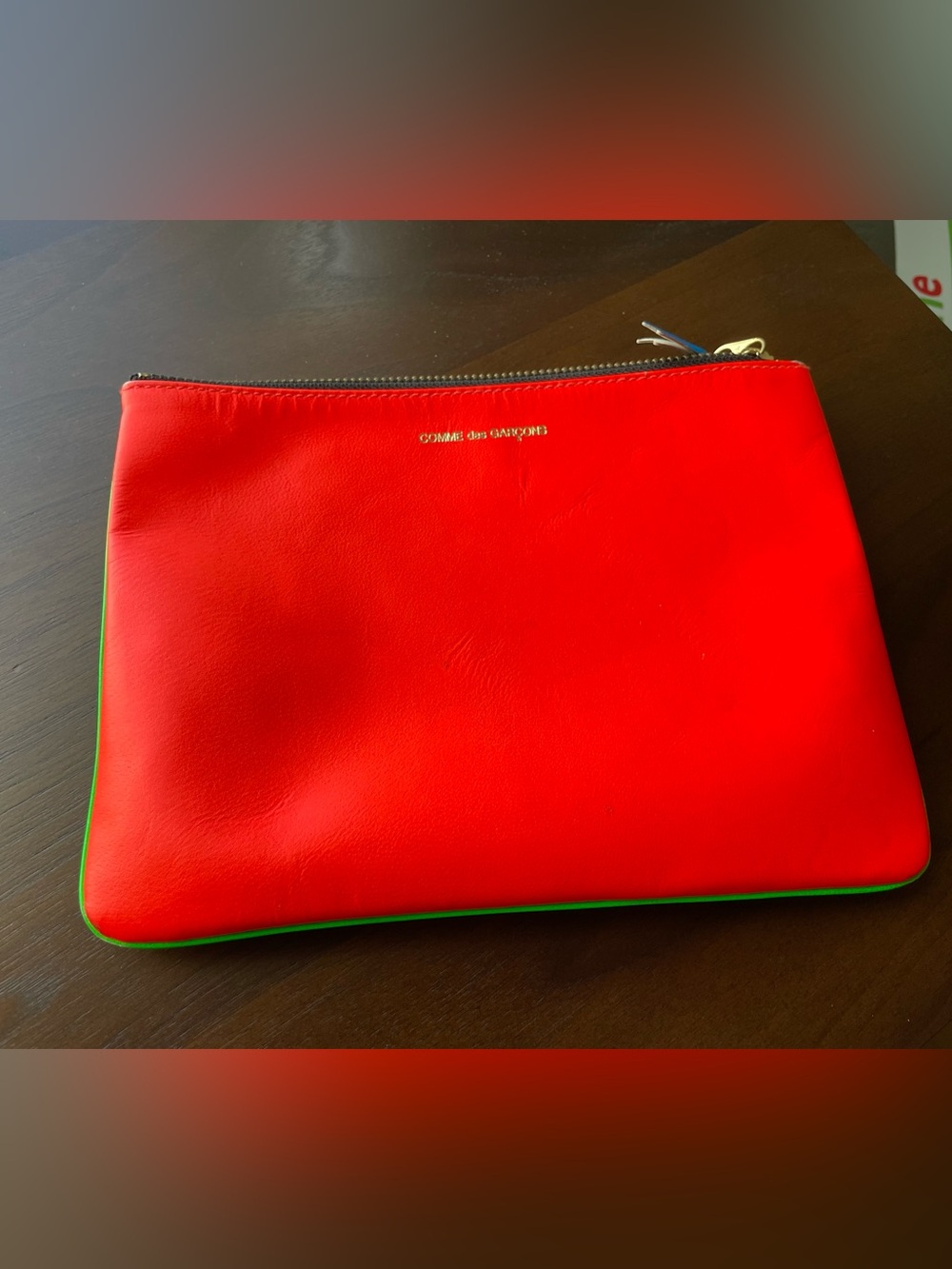 Comme des Garcons Red leather pouch with green trim